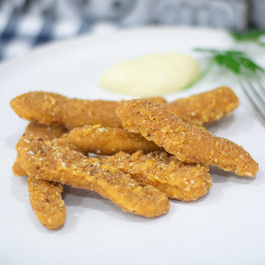 Fingers de pollo con guarnición y salsa casera